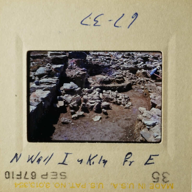 Two vintage photos showcase archaeological excavation sites with stone ruins and rocky terrain.