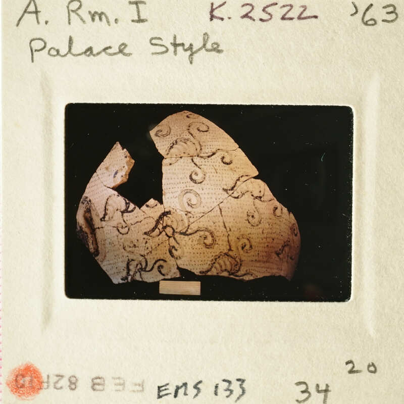 Old photograph of an ancient artifact with intricate designs and patterns.