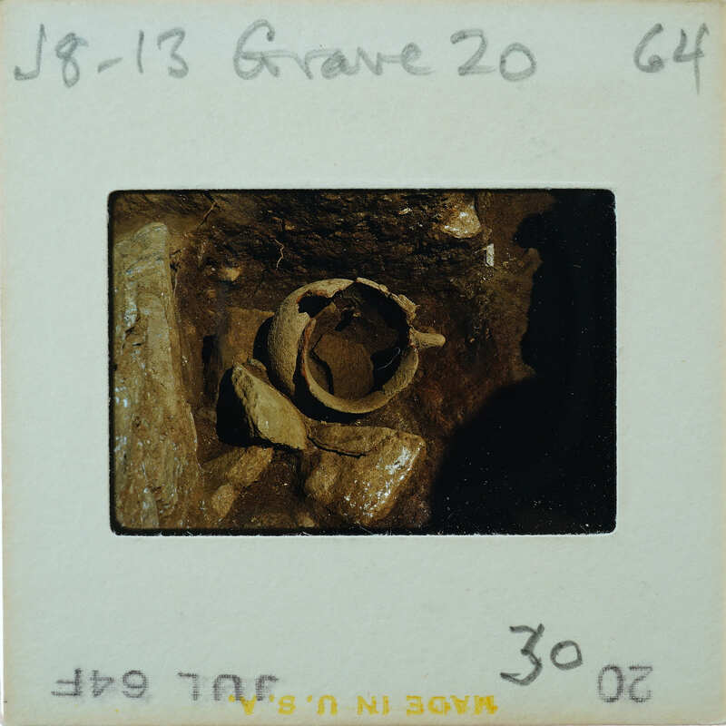 A photograph of a cave with stalactites and other rock formations.