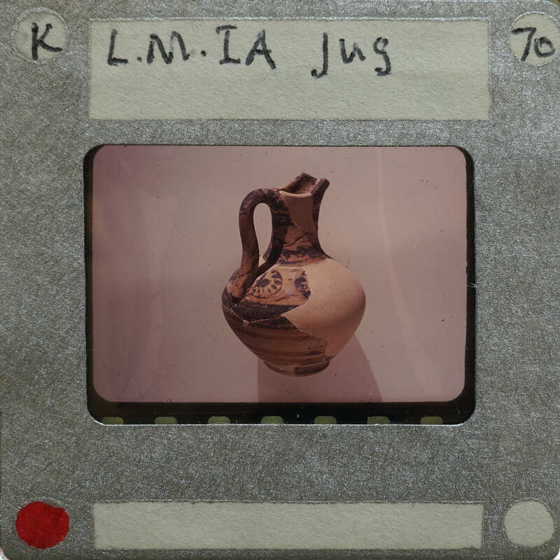 A photograph of an jug with a label and number on the front.