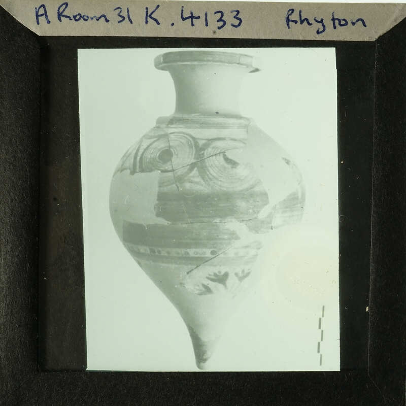 Ancient Greek vase with intricate designs.