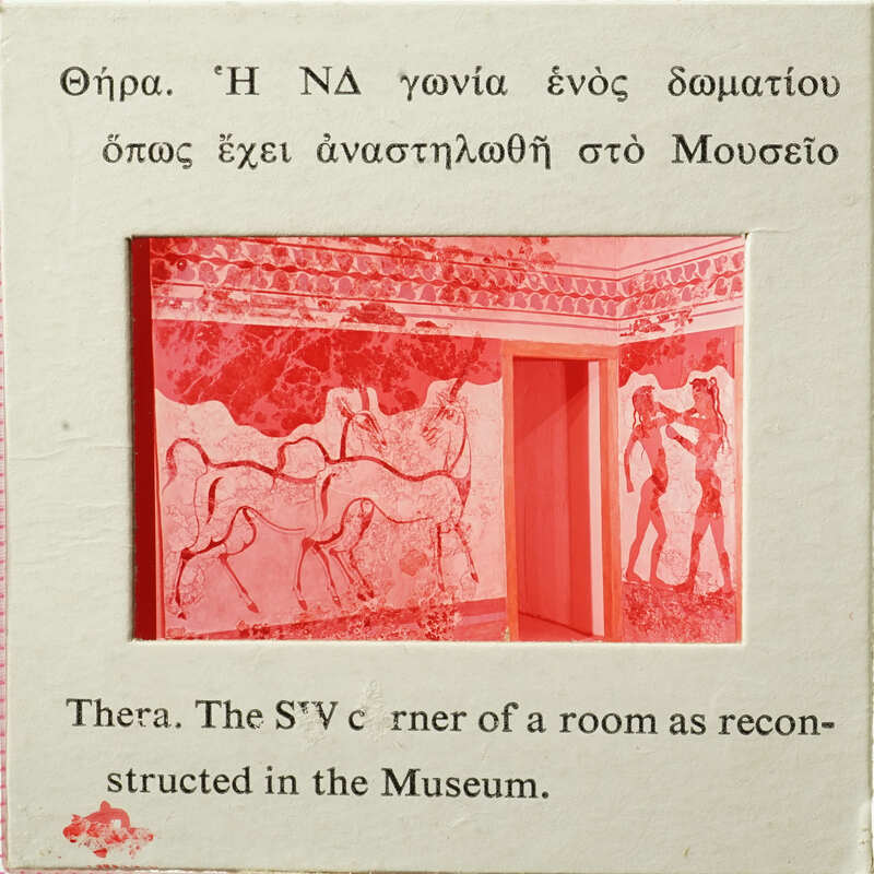 Ancient Greek room with fresco painting of animals and boxers on display at a museum.