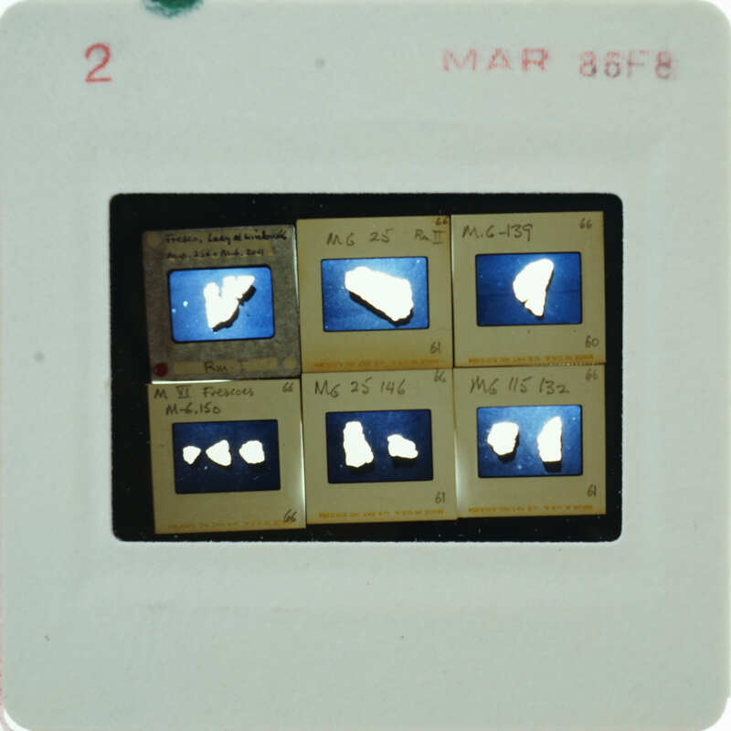 A slide of multiple slides of painted wall plaster fragments