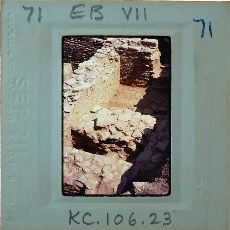 Excavated stone walls in various directions.