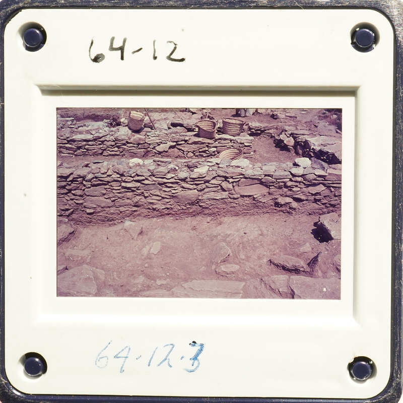 Old photograph of rock formation with annotations on white border.