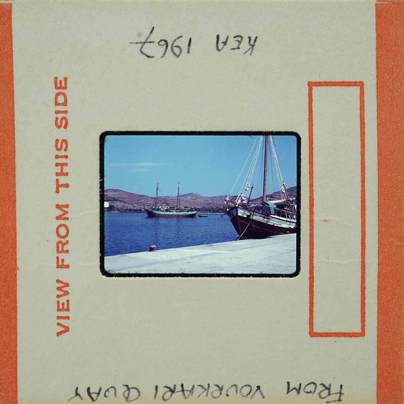 Picture of a dock with boats on the water.