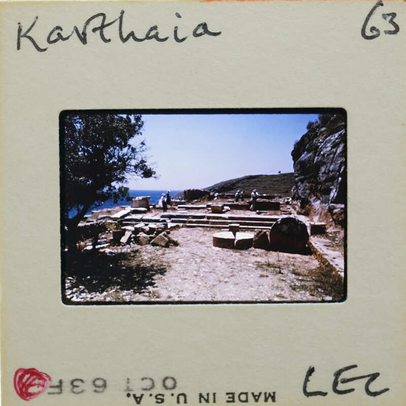 An old photograph of a stone structure with ruins and vegetation, labeled "Katharina" on the border.