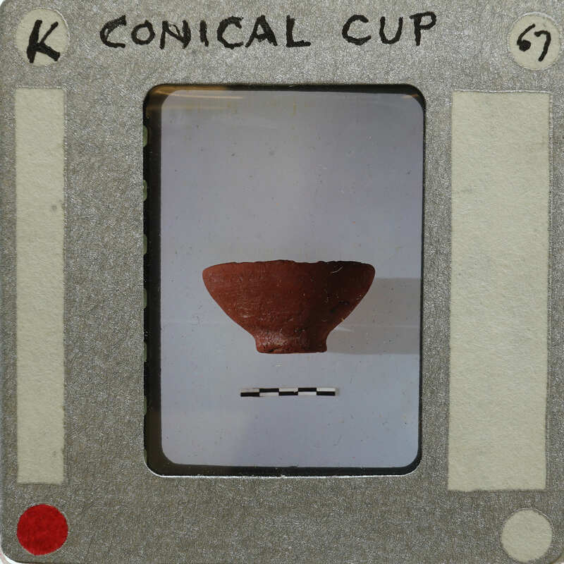 Small clay pot on white background.