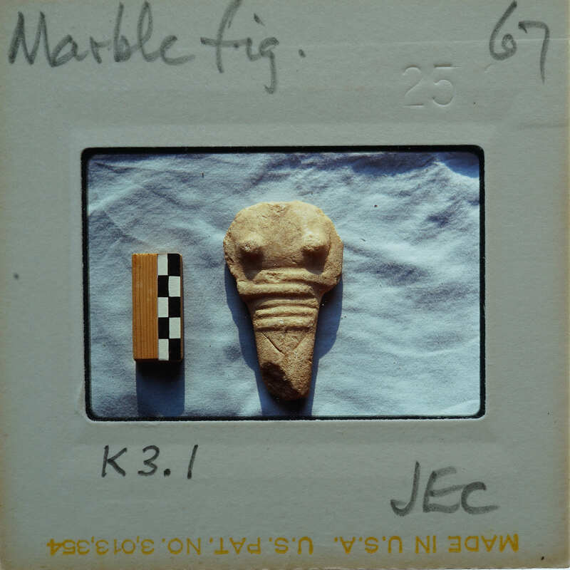 Headless marble figurine from the front.