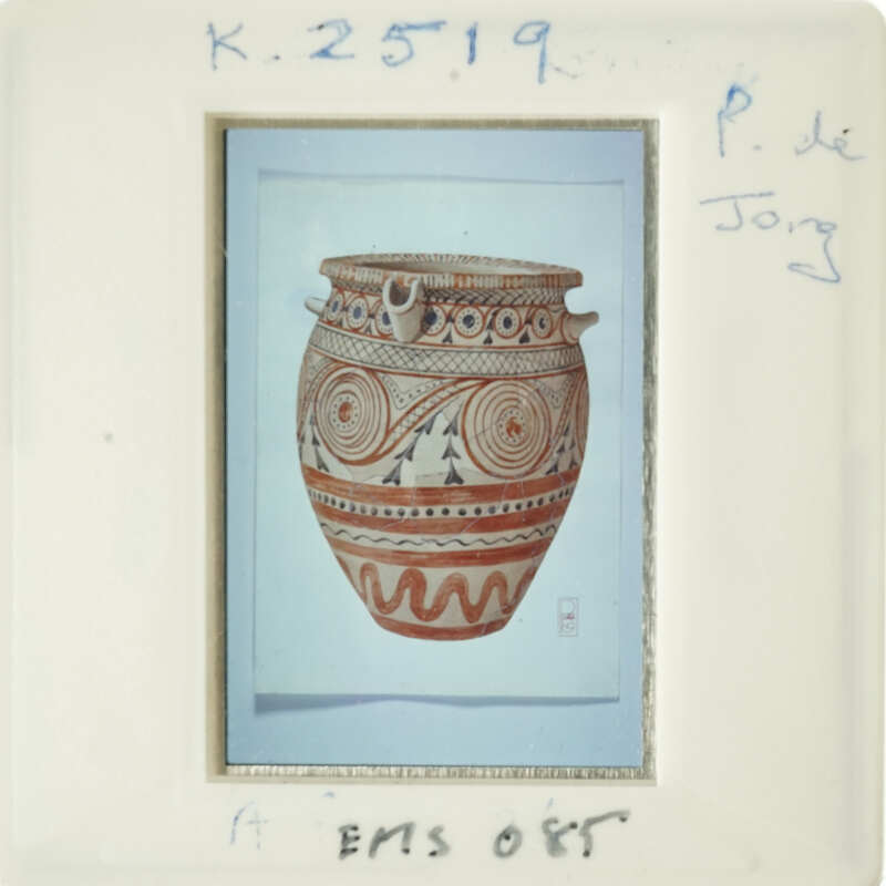 Ancient red and black ceramic pot with intricate patterns.