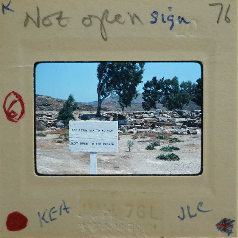 A photograph of a sign indicating that the area is not open to the public, with handwritten notes on the film strip.