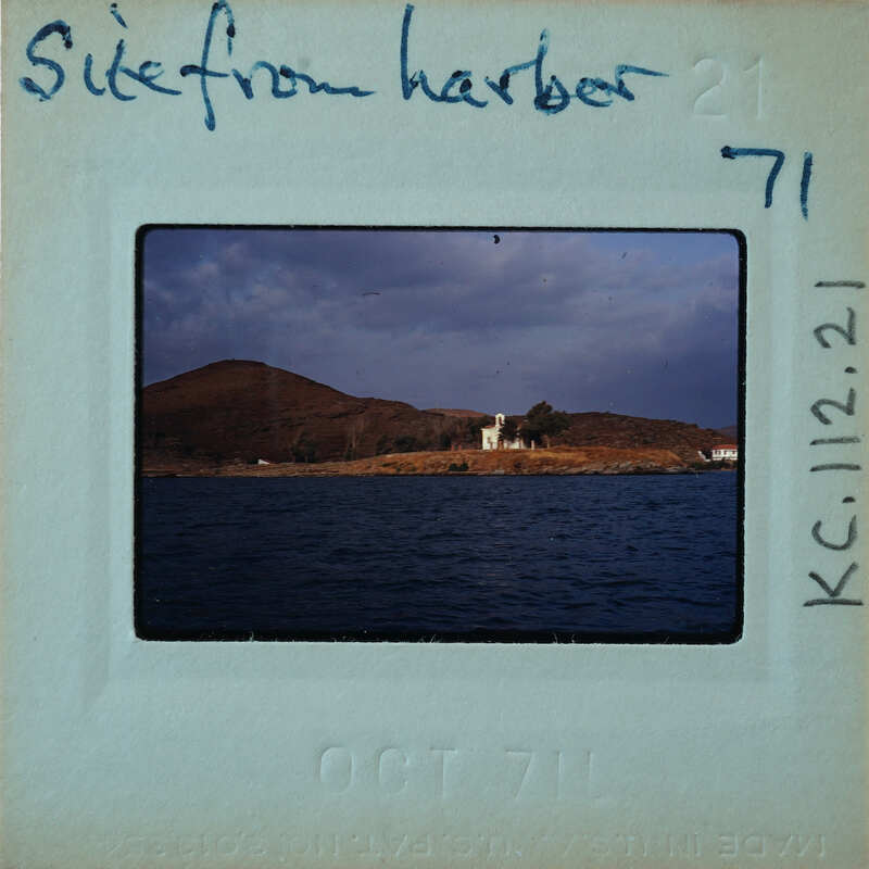 Harbor with a church on a hillside, taken on October 7th, 1962.