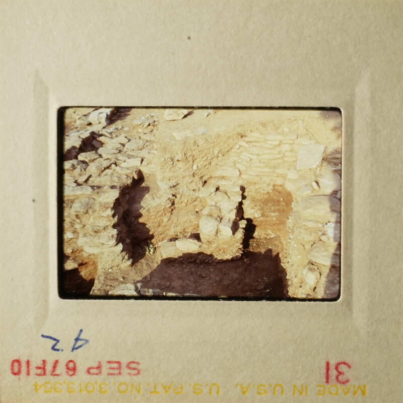 Two photos showcasing ancient ruins, with one focusing on a stone wall and the other capturing an intricate structure within a building.