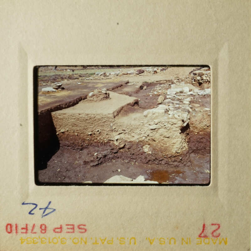 The images show archaeological excavation sites with stone structures and earth mounds, likely taken from an airplane perspective.