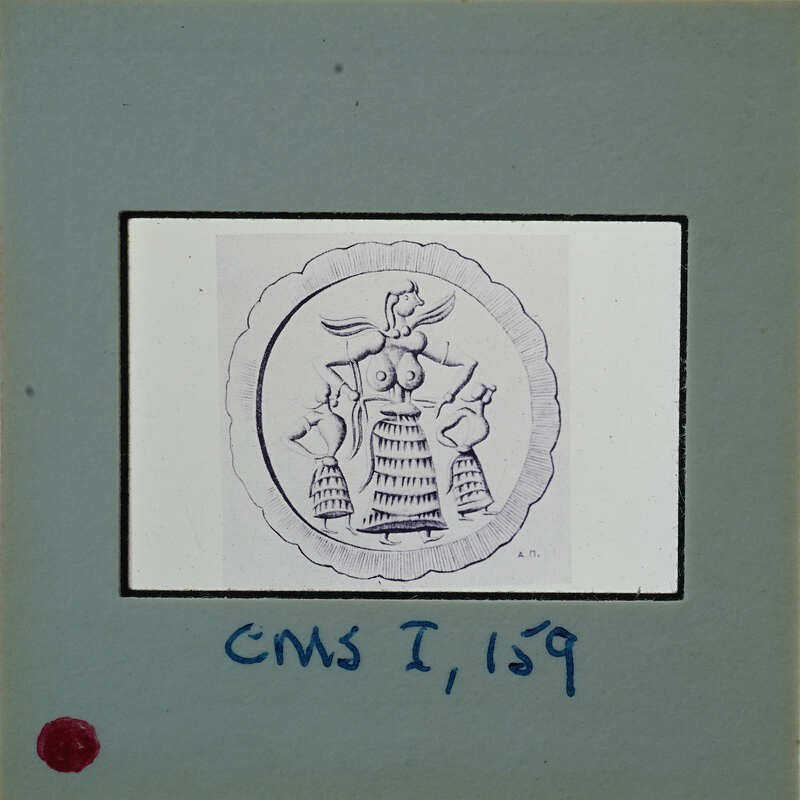 Image of a seal stone with an embossed figure on it, displayed on a card with handwritten notes.