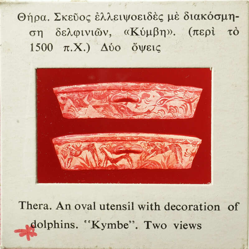 Vase with dolphin decoration, displayed on a red background with accompanying text.