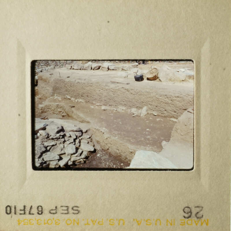 The images show two different scenes, possibly from an archaeological site, with dirt and rocks visible.