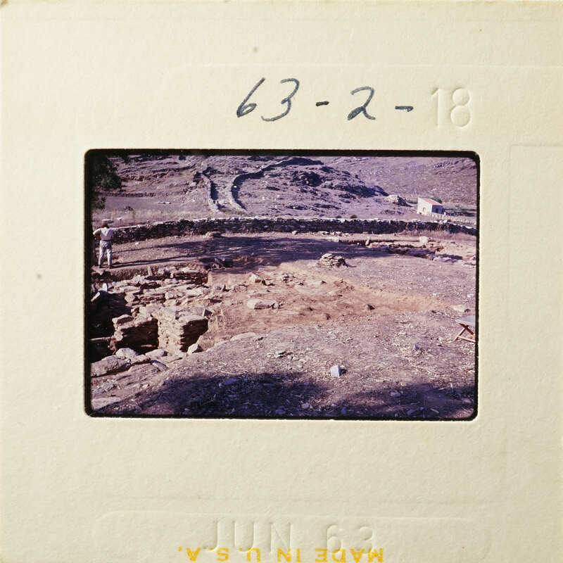 Ancient ruins with dirt and rocks, possibly part of an archaeological site.