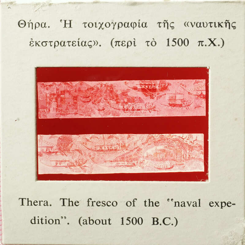 Old red and white slide with faded imagery, possibly depicting naval exploration from around 1500 BCE.