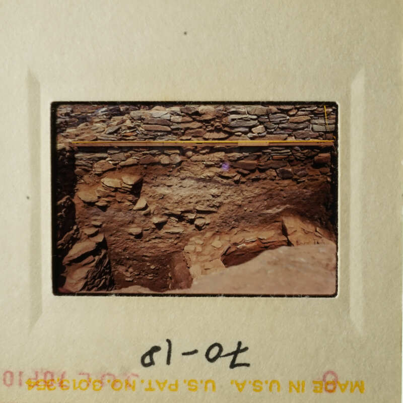 The images depict an underground cave-like structure with stone walls and floor, possibly a natural formation or an excavated site.