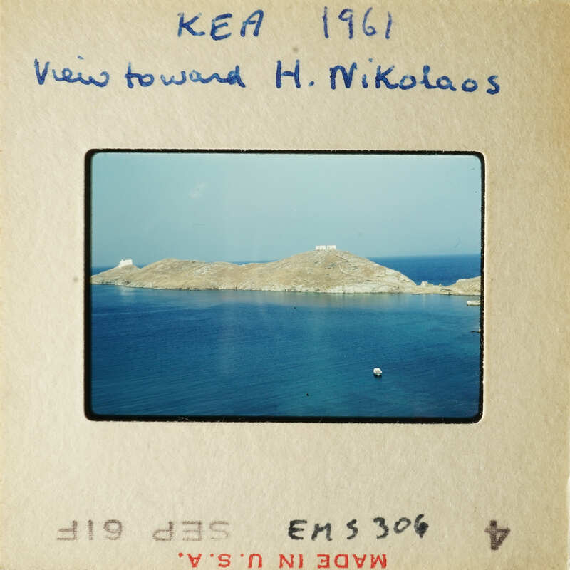 View of an island with blue water and clear skies, as seen from KEA in 1961.
