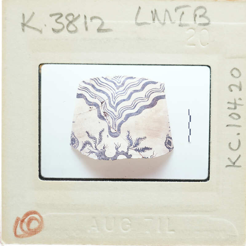 Vase fragment (K.3812) with wavy line design.