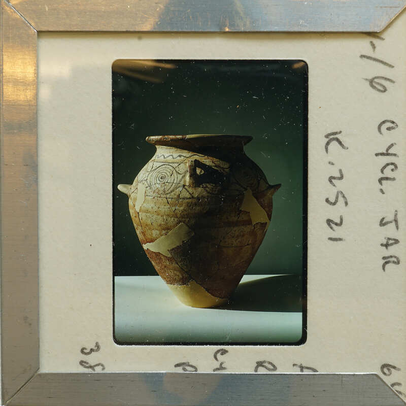 Multi handled reassembled jar (K.2521) with spiral and other decorations.