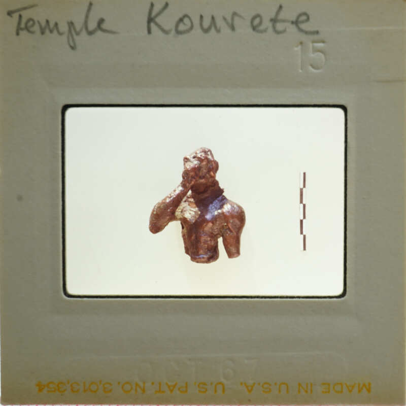 Small figurine of a person on a film strip.