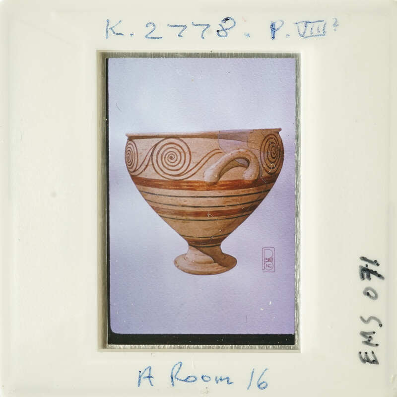 Ancient Greek style pottery with swirling patterns.