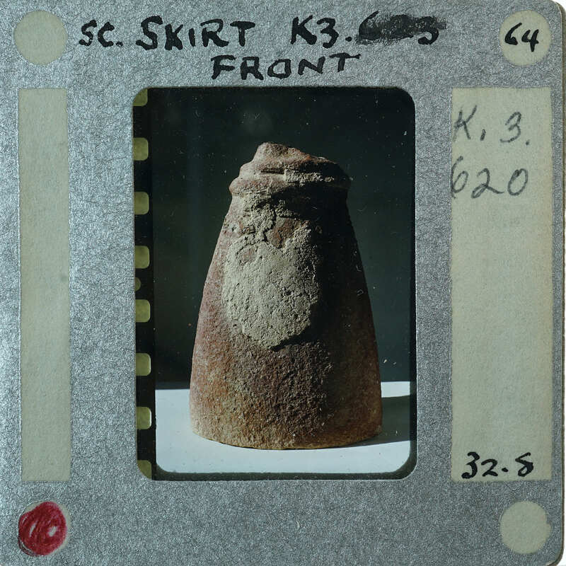 Terracotta figurine skirt.