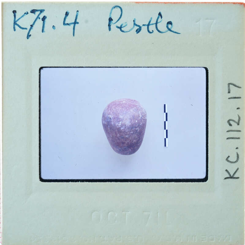 Purple stone with a white background, K7.14.