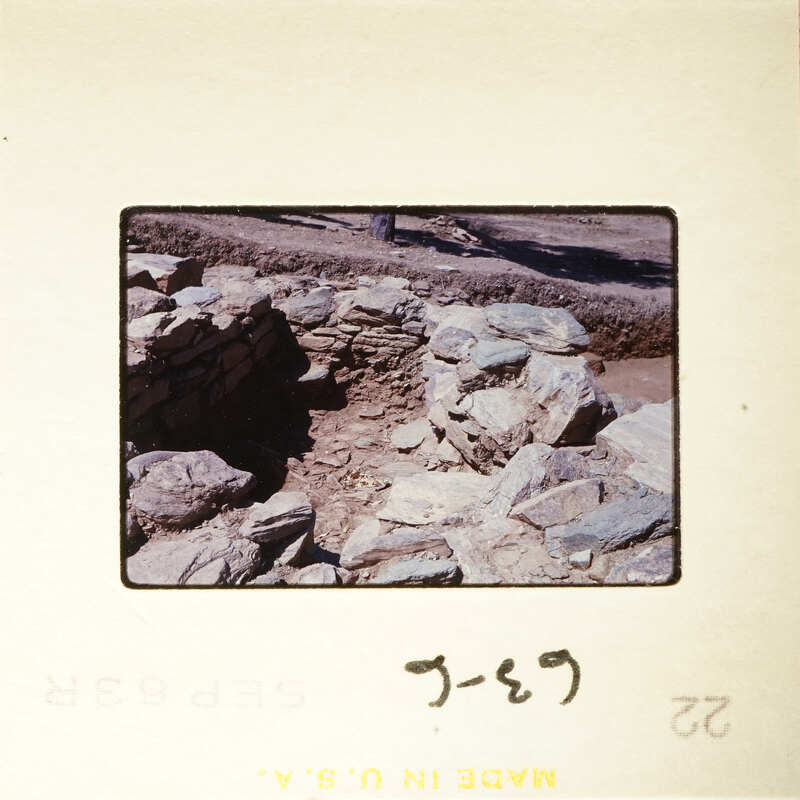 Old stone ruins with sunlight and shadows.