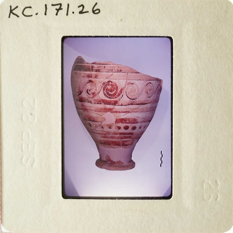 Ancient Greek vase with red-figure technique and intricate designs.