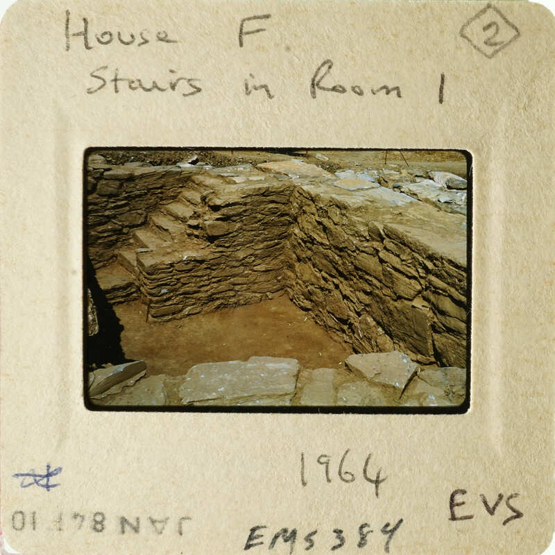 Old photograph of stone stairs with handwritten notes on an envelope.