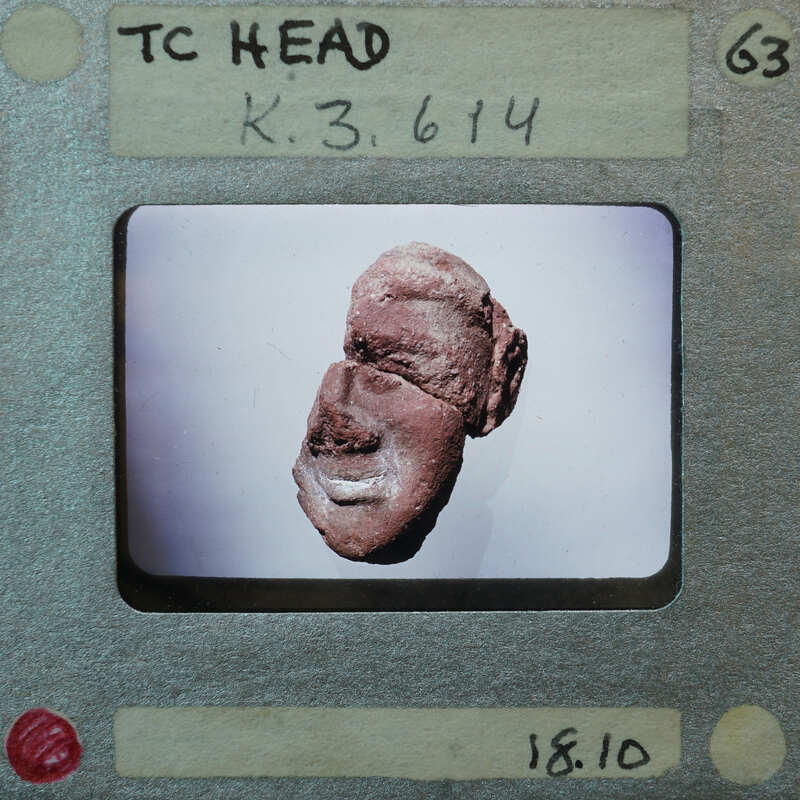 Terracotta figurine face fragments partially restored K3.614.