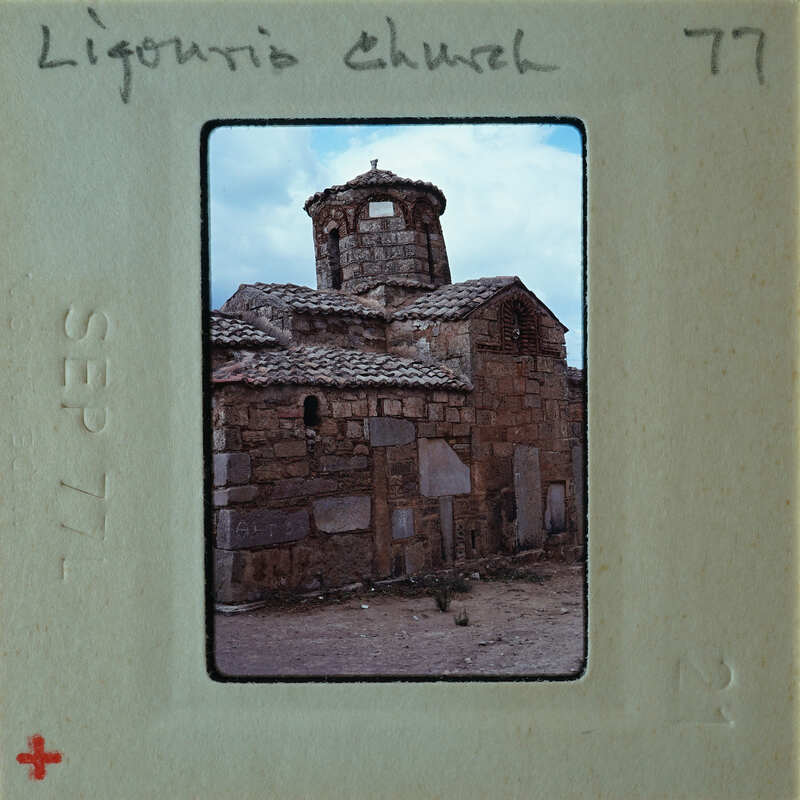 Old stone church with a bell tower, taken on September 17, 1977.
