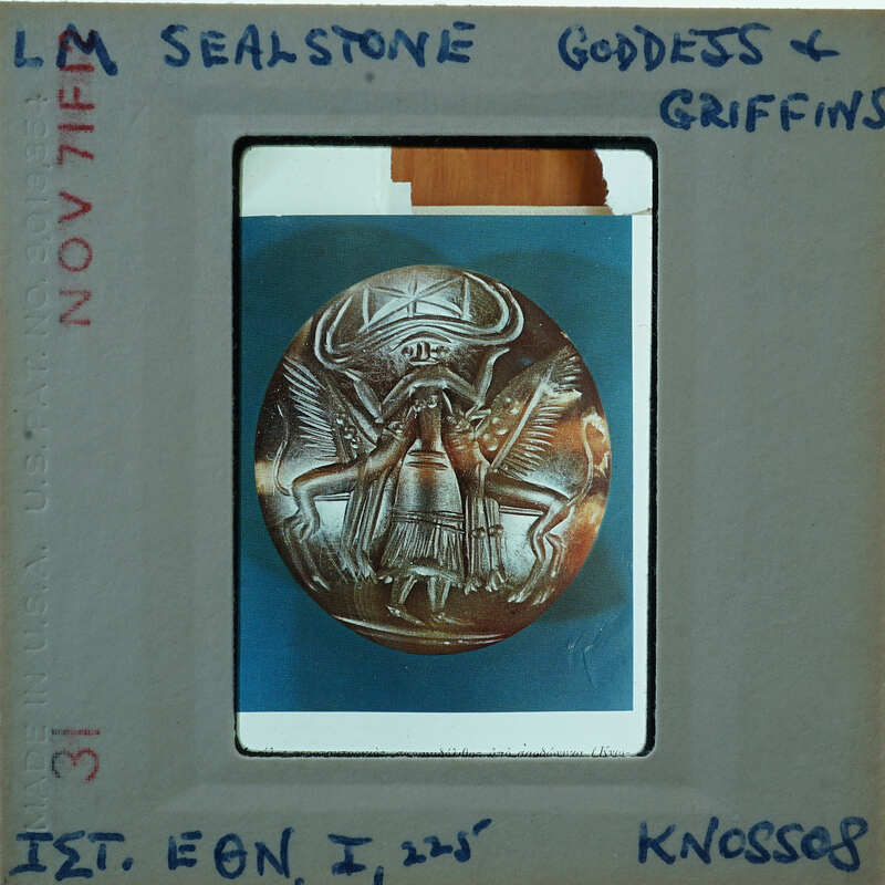 Ancient sealstone with intricate carvings of a deity or mythical creature, possibly from the Scythian culture.