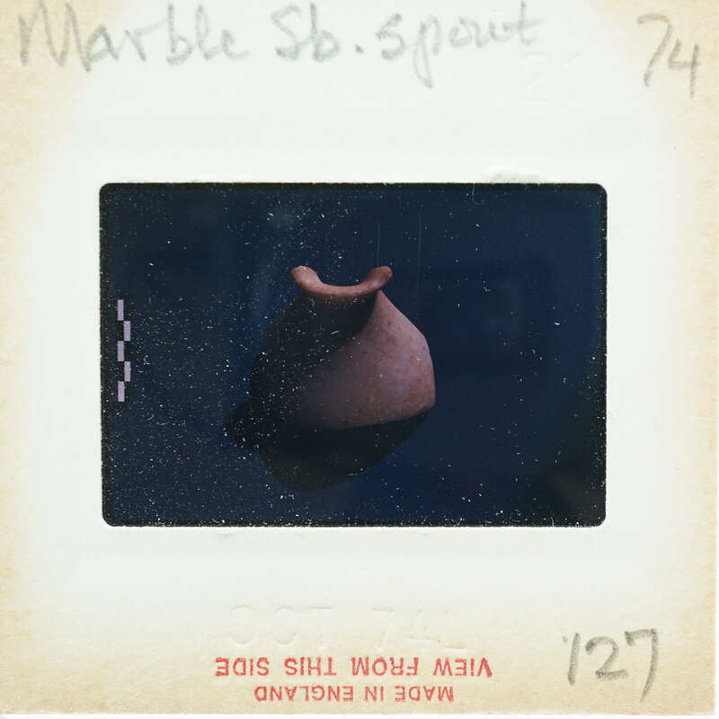 Clay pot with an aged appearance.