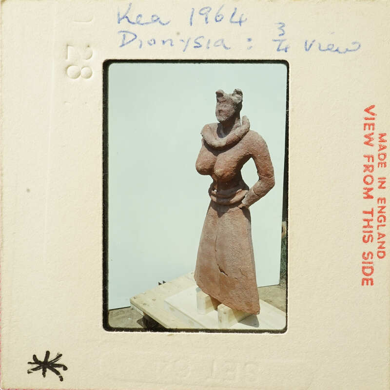 Ancient clay figurine with exaggerated features, possibly representing a deity or mythical creature.