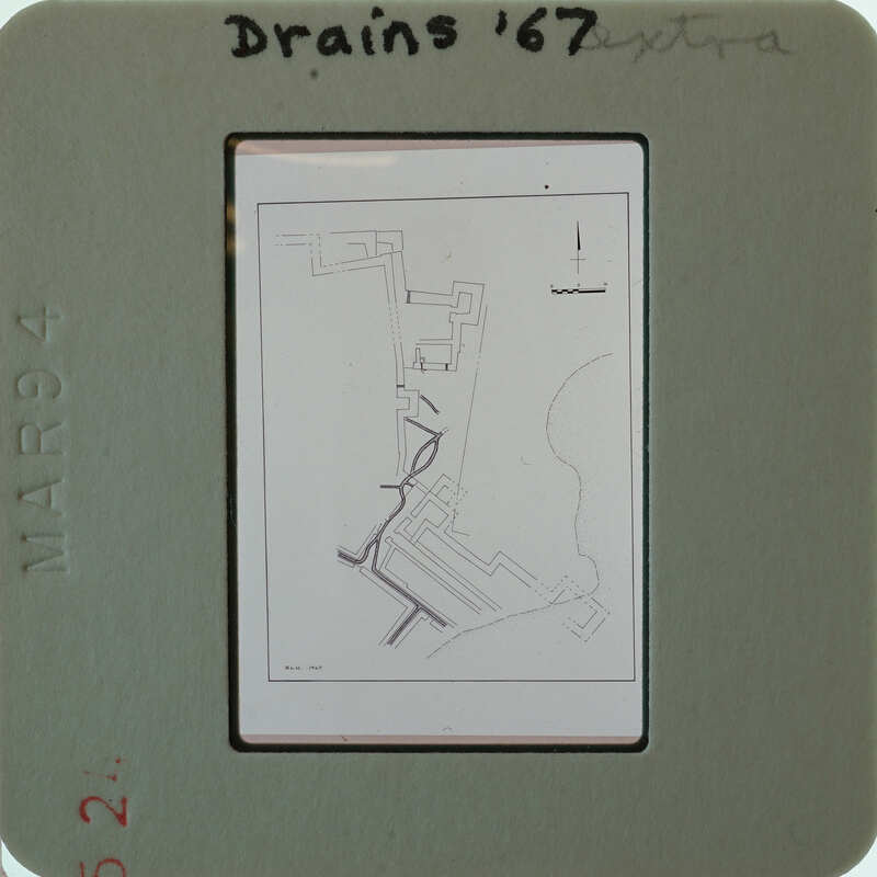 A black and white map of a drainage system from the year 1967, displayed on a card with a label.