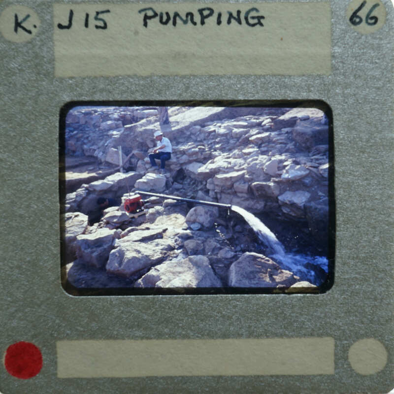 A film strip showing a person working on a rocky surface with water flowing nearby.