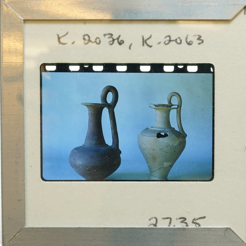 Two reassembled ancient one handled jugs on display, K.2036, K.2063.