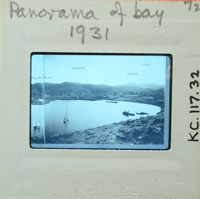 Black and white panoramic photograph of a bay with boats, taken in 1931.