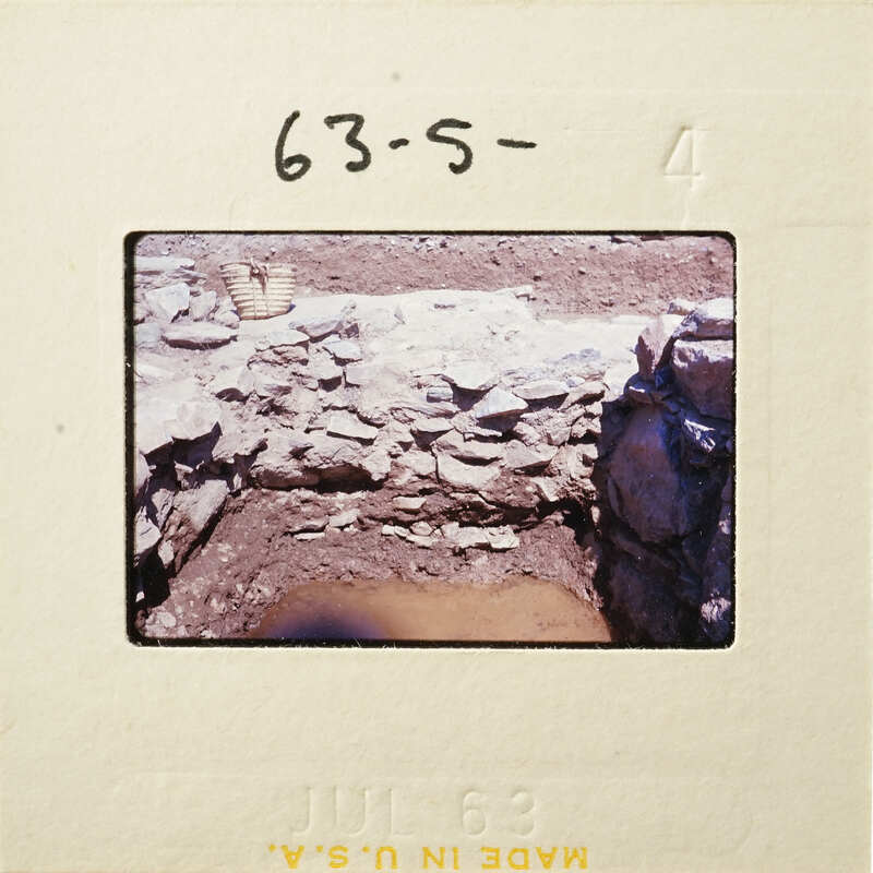 A photograph showing an excavation site with exposed rock and soil.