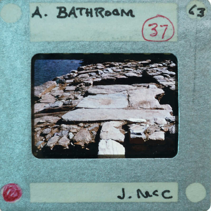 Picture of a bathroom with number 37 on it.