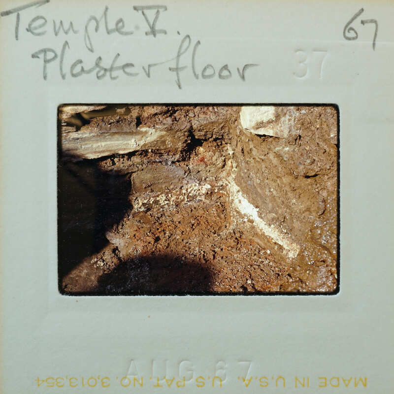 Stone walls and muddy floor.