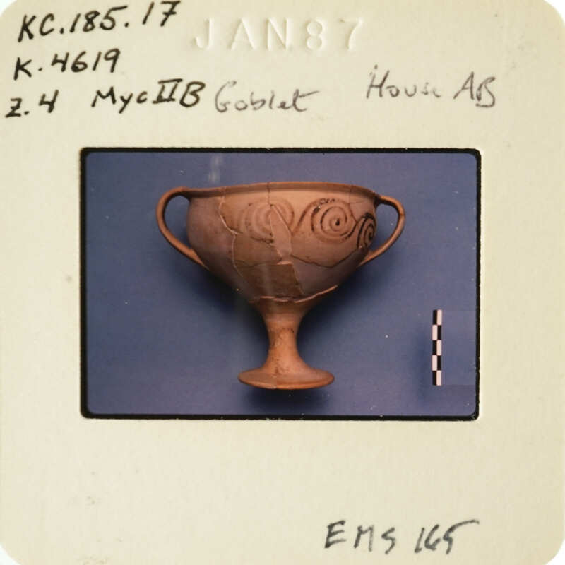 Ancient Greek vase with intricate designs.