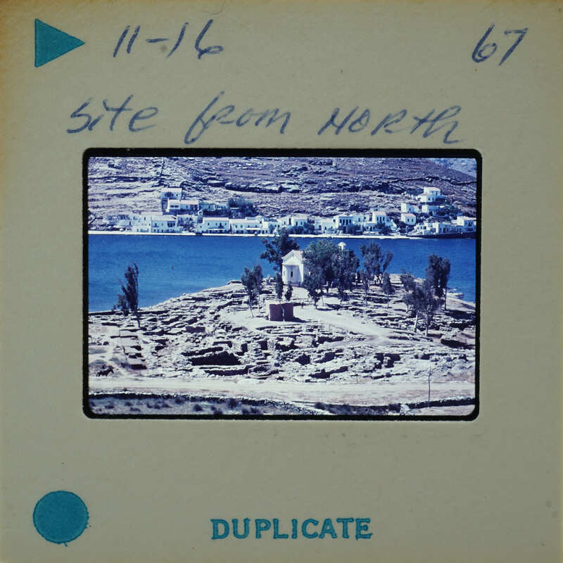 Picture of a coastal village with an old photo label.