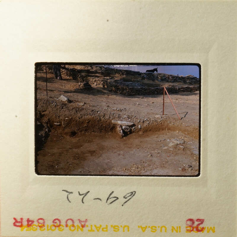 Ancient ruins with dirt and rocks, possibly from an archaeological site.