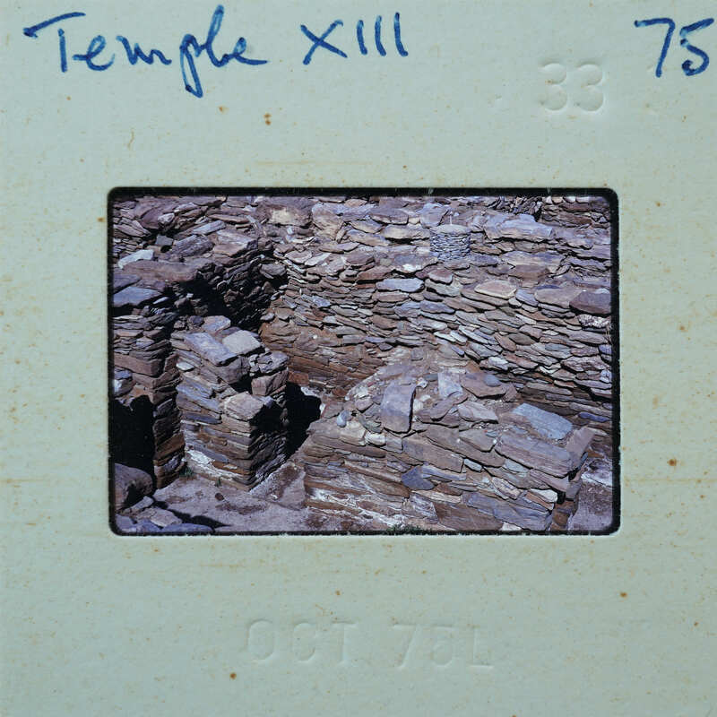 Stone walls and with doorway and floor.